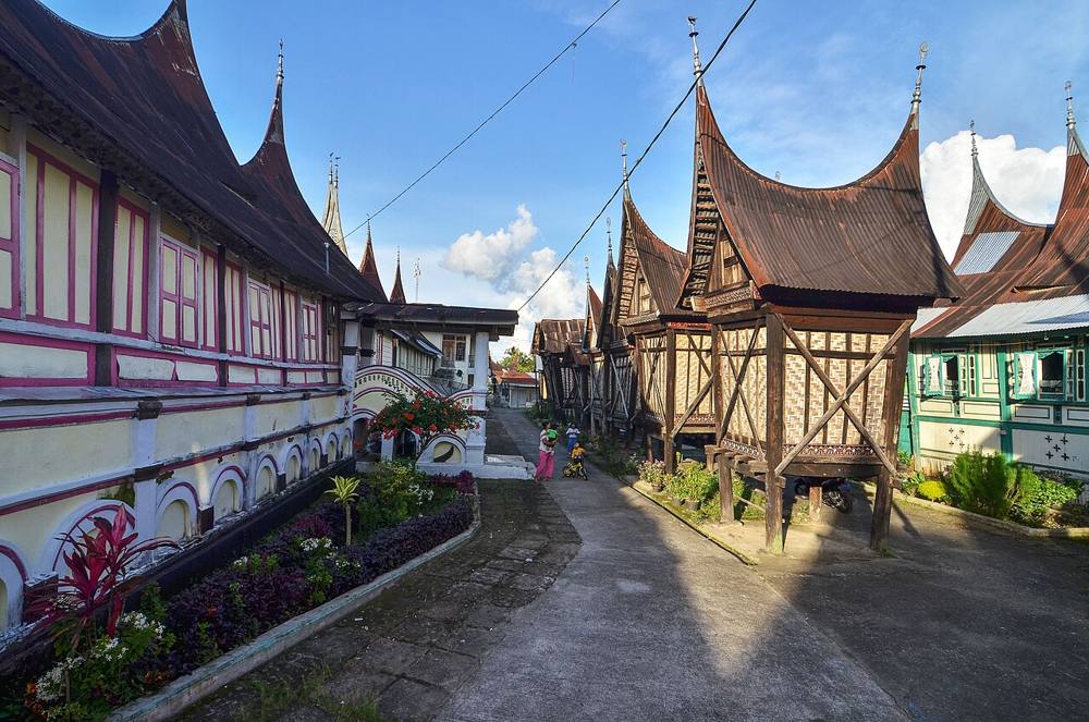 A cluster of rumah gadang houses at Balimbiang, Tanah Datar, with carved painted facades